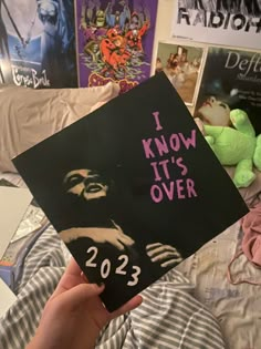 someone is holding up a book that says i know it's over, 2012