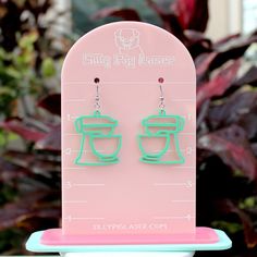 "Acrylic stand mixer earrings These earrings are perfect for anyone who loves to bake! You can match the color to your beautiful stand mixer! We have listed 15 of the most popular colors for you to choose from! >> These super cute earrings are made out of 1/8\" acrylic >> They are lightweight (2-3 oz. per pair) and hang approximately 2.5\" long >> We use high quality metals that are hypo-allergenic and nickel free. They are rust and tarnish proof. >> Please read and follow all instructions regarding earring and acrylic care to insure your items stay looking like new. >> You will receive ONE pair of earrings with silicone earring backs. Photo props are not included. EARRING CARE AND INFO: >> The metal ear wire is made out of surgical grade stainless steel which is hypo-allergenic and nickel Glowforge Earrings Acrylic, Acrylic Clear Earrings, Acrylic Earring Stand, Mirrored Acrylic Earrings, Baker Aesthetic, Heart Acrylic Earrings, Glowforge Ideas, Popular Earrings, Earrings Trendy