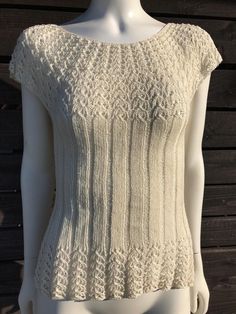 This is a vintage handmade ivory blouse from the 1990s, knitted in several different patterns. The front and the hem of the blouse are slightly sheer, which gives it a special charm. The blouse is very stretchy and elastic.  The material is breathable, permeable and healthy for the body. In addition, the blouse looks very impressive. Wear it everywhere, whether it's to a party or to work. Material: linen and cotton blend. Size: (I think best for)  EUR 38 / UK 10 The M - Medium Also check the mea Cottagecore Blouse, Mesh Tops, Ivory Blouse, Beige Blouse, Linen Yarn, Linen Women, Natural Linen, Linen Blend, Knit Top