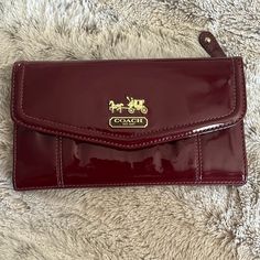 Never Used. Excellent Condition! Please See Photos. Tag Included But Price Was Taken Off. Beautiful & Clean. Happy Shopping! Red Coach Bag, Red Coach Wallets With Interior Card Slots, Elegant Red Coach Wallet, Coach Red Rectangular Wallet, Coach Red Wallet With Removable Pouch, Coach Brown Wallet For On-the-go, Girl Shopping, Pretty Purses, Red Wallet