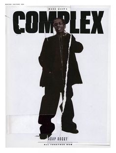 a man standing in front of a poster with the words complex on it's side