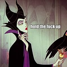 an animated image of maleficent holding a bird with the caption hold the fock up