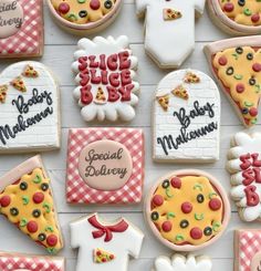 many decorated cookies are displayed on a table