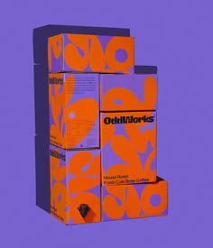 three orange boxes stacked on top of each other in front of a purple and blue background