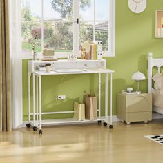 a bedroom with green walls and a white desk in the corner next to a bed