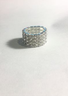 This lovely sparkling clear crystal rhinestone 4 Row Elastic Stretch Ring makes a statement! Perfect for weddings, Engagements, Parties or Anytime ! You don't have to worry about the size because it stretches so if you have a small finger or larger finger it will fit. Please feel free to ask any questions as I do not accept returns ! Stretch Rings, Elastic Rings, Plus Size Rings, Stackable Ring Sets, Stretch Ring, Copper Rings, Pretty Rings, Pink Ring, Ring Fit