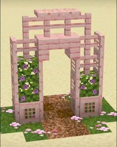 an image of a pink gate made out of blocks with flowers growing on the sides