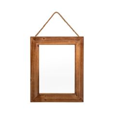 a wooden frame hanging on a rope with a mirror in the middle and a white background