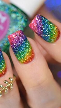 Whether male, female, cis, queer, or gender fluid, these rainbow nail designs are a chance to explore a world of color.   #PRIDE Rainbow Glitter Nails, Nail Design Glitter, Rainbow Nails Design, Rainbow Nail Art, Rainbow Nail, Ombre Nails Glitter, Square Nail Designs, Colorful Nail, Gender Fluid