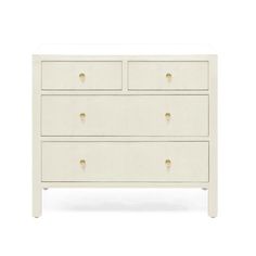 a white dresser with three drawers and gold handles