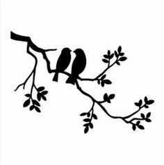 two birds sitting on a tree branch with leaves