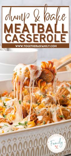 a casserole dish with meatballs and cheese being lifted from the casserole