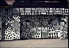 an artisticly designed wall on the side of a building