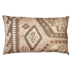 a brown and white pillow on a white background