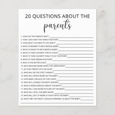 the 20 questions about the parents game on a marble surface with white paper and black ink