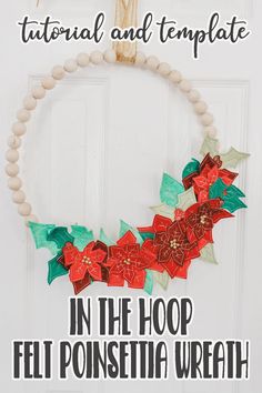 a christmas wreath with poinsettia on it and the words in the hoop