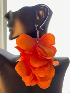 Fashion alert! Beautiful orange earrings are ready to change your life! Do you have a basic orange top and you need to accessorize? These earrings are a fashion statement by themselves! Lightweight, long and ready to make an appearance! You can even get any solid color dress and spice up your wardrobe with these earrings. Please note, these are handmade (with love) so they may be slightly different than the photo. Orange Flower Earrings For Gift, Orange Flower Shaped Earrings For Summer, Orange Flower-shaped Earrings For Summer, Party Orange Earrings With Ear Wire, Elegant Orange Flower Earrings, Orange Flower Shaped Earrings For Party, Orange Dangle Flower Earrings With Ear Wire, Orange Flower Earrings For Party, Earring Inspo