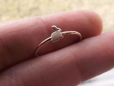 Simple style knuckle or stacking ring! Great subtle accent easy and durable for everyday wear. Gorgeous simple sterling silver bunny ring that is great for stacking! If you do not want a polished bunny you can request for a matte silver/white rabbit. You may select your own band metal though the rabbit remains silver! This little bunny rests on a 16 gauge smooth band! Pictured is polished 14k Rose Goldfill.  Band: 16 gauge (1.3mm) ★ IMPORTANT SHIPPING & PRODUCTION DETAILS!! ★ All of FMJ pieces a Bunny Ring, Rabbit Ring, Bunny Bunny, Band Metal, Simple Ring, Hammered Rings, Animal Rings, Textured Ring, Ring Simple