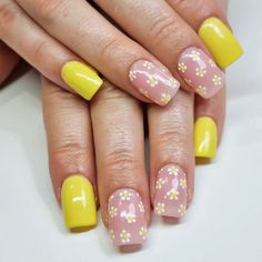 A bright and shiny yellow nail polish is enough to match beautiful white daisies with. Try this nail design out. Yellow Nail