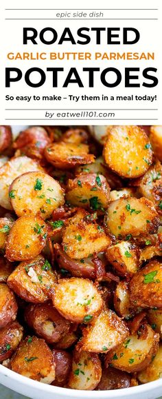 roasted garlic butter parmesan potatoes in a white bowl with text overlay that reads roasted garlic butter parmesan potatoes