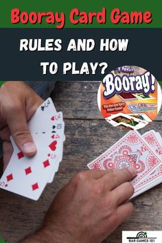 a person holding playing cards with the text booray card game rules and how to play?