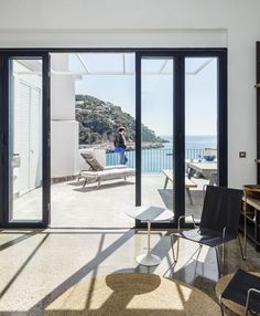 an open living room with sliding glass doors