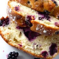 two slices of bread with blueberries on top