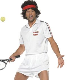 a man with curly hair is holding a tennis racquet and hitting the ball