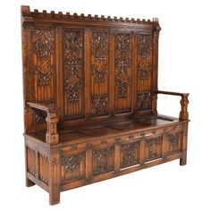 Magnificent and ultra rare Gothic Revival high back hall bench. Striking Dutch design from the 1900s. Solid oak frame with original hand-carved elements in the back and the sides! Underneath the seat with the two original wrought iron hinges, you will find extra storage space. This wonderful Gothic Revival high back hall bench is in very good original condition with minor wear consistent with age and use, preserving a beautiful patina. A real eye-catcher in your home or office. We will ship this Iron Hinges, Hall Bench, Gothic Revival, Extra Storage Space, Dutch Design, Wooden Crate, Extra Storage, Solid Oak, Wrought Iron