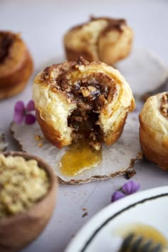 several pastries are sitting on a plate