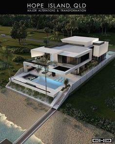 an aerial view of a modern house on the beach