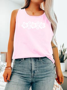 Express your Inner Coconut Girl and get ready for Summer or Beachy Vacation with this cute Hawaiian Hibiscus Flowers Tank Top! Perfect for Summer or Beachy Vacation, Comfort Colors® Unisex Tank Tops make the perfect Beach Coverup, and are super soft and comfy! Size up for a Trendy Oversized look! SHIPS FREE! SIZING TIPS: Size up 2-3 sizes from your "usual size" to get the "Oversized" Look! (2 sizes up is most common, and 3 sizes up is more dramatic) For a "relaxed fit" order your "usual size". W Pink Beachwear Tank Top For Vacation, Pink Beachy Tops For Poolside, Pink Summer Tank Top For Vacation, Tropical Style Tank Top For Beach, Summer Tops With Hibiscus Print For Vacation, Pink Tank Top For Beach Vacation, White Tank Top For Beach Party Vacation, Pink Hawaiian Vacation Tops, Pink Hawaiian Top For Vacation