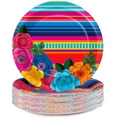 multicolored paper plates stacked on top of each other with flowers and stripes in the background