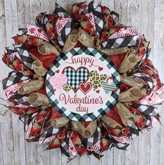 a valentine's day wreath with the words happy valentine's day on it