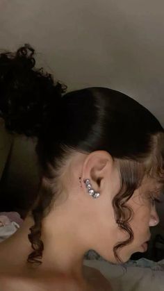 a woman with ear piercings on her ears