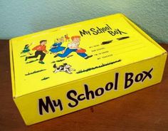 a yellow box with an image of a boy and dog on it