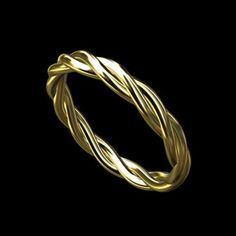 a gold ring on a black background