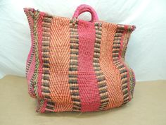 LARGE HANDMADE WOVEN BAG BEACH PICNIC BLANKET BAG  20" x 19" x 9 PINK ORANGE Good to fair condition. the bag is a little brittle if folding it.  Payment is due within 3 days of auction end. Shipment will be made within 1 business day of confirmed payment, usually by USPS or FEDEX. Shipping for this item will be calculated based on winning bidder‘s location. Packaging is done very carefully using generous amounts of packing peanuts and bubble wrap. Returns are accepted within 30 days, seller pays Large Capacity Pink Beach Shoulder Bag, Large Capacity Pink Shoulder Beach Bag, Pink Satchel Shoulder Bag For Beach, Pink Satchel Shoulder Bag For The Beach, Large Pink Shopping Bag, Casual Pink Rectangular Beach Bag, Large Pink Shoulder Bag For Shopping, Pink Rectangular Beach Bag For Travel, Pink Woven Satchel Bag