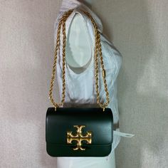 Eleanor Small Convertible Shoulder Bag/Cross Body Bag By Tory Burch. This Bag Is Made Of Dark Green Genuine Smooth Leather.. Small Press Mark From The Chain Strap On The Upper Back As Shown This Bag Is Convertible. Can Be Carried As A Shoulder Bag Or Cross Body Bag. Dimensions: 7.5" Wide Across Bottom X 5" Tall Center X 2.5" Deep. Strap Drop Doubled 11.5", Single 22". Interior: 3 Compartments. 1 Zipper Compartment Flap Closure Secured With Magnetic Button. Leather Interior. Gold Tone Metalware. Tory Burch Crocodile Bag, Lv Neonoe, Sling Bag Black, Luxury Bags Collection, Tory Burch Purse, Tory Burch Handbags, Tory Burch Bag, Cross Body Bag, Leather Interior