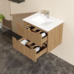 a bathroom with a sink and wooden cabinets