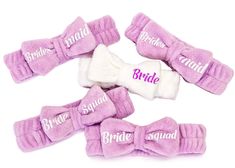 four bride's bows with the word bride written on them in pink and white