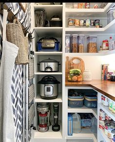 an organized pantry with lots of food in it