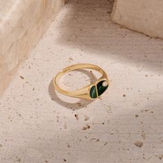 Discover the epitome of romantic elegance with our Green Enamel Heart Signet Ring. Crafted to perfection, this enchanting ring features a timeless heart signet design with vivid green enamel. Whether worn as a symbol of affection or as a chic statement piece, the Green Enamel Heart Signet Ring is a beautiful addition to any jewelry collection, offering a touch of grace and charm to every moment. - Made in 14k solid gold - Decorated with handset white cubic zirconia stone - Finished with Green En Fine Jewelry Green Heart Ring For May Birthstone, Green Heart Ring For May Birthstone, Fine Jewelry Style, Green Heart Ring For May Birthstone, Elegant Green Enamel Ring With Polished Finish, Elegant Heart-shaped Signet Ring For Formal Occasions, Classic Green Enamel Jewelry, Elegant Green Enamel Ring, Elegant Green Heart Promise Ring, Green Oval Enamel Ring For Formal Occasions