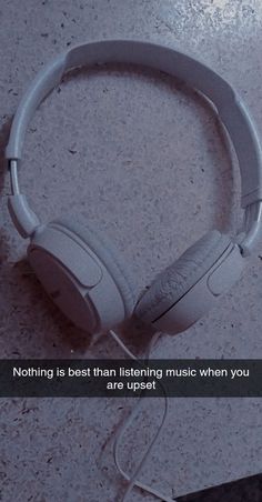 a pair of headphones sitting on top of a table