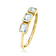 Ross-Simons - .70 ct. t. w. Aquamarine Three-Stone Ring in 14kt Yellow Gold. Size 9. RS Pure. Modern designs that complete your outfit and complement your personality. A simple take on the classic three-stone style, this dainty ring shimmers with .70 ct. t. w. emerald-cut aquamarines in glossy 14kt yellow gold. Wear it solo or stacked! 1/8" wide. Aquamarine three-stone ring. Aquamarine birthstones are the perfect gift for March birthdays. Yellow Gold Three Stone Topaz Ring In 14k Gold, March Birthdays, Emerald Cut Aquamarine Ring, Aquamarine Birthstone, Fine Jewelery, 3 Stone Rings, Yellow Gold Jewelry, Aqua Marine, Aquamarine Rings