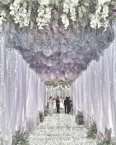 an instagramted photo of a couple walking down the aisle at their wedding