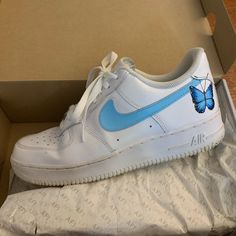 Custom Nike Air Force 1 07, White With A Beautiful Painting! I Chose The Design. I Bought These Af1’s From Nike Then Had Them Shipped To Xodestdesign, Where She Painted The Nike Side And Back Light Blue And Hand Painted The Beautiful Butterfly On The Side. I Spent About $200/$250 On These And Have Only Worn Them A Handful Of Times If That! Just Not My Style. Perfect Condition, Sole Is A Little Dirty But Can Be Cleaned. Box Is A Little Damaged From Sitting But Shoe Is In Perfect Shape. Such A Beautiful And One Of A Kind Shoe, Just No Longer My Style. Size 9! Really The Best Deal! Long I, Custom Nikes, White Nikes, Air Force 1, Nike Air Force, Beautiful Butterflies, Womens Shoes Sneakers, Nike Women, Nike Shoes