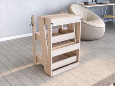 a wooden shelf sitting on top of a hard wood floor next to a white chair