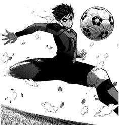 a man in black and white kicking a soccer ball through the air with his hand