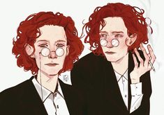 two red haired women with glasses on their faces